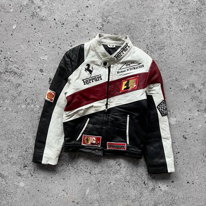 Veste en cuir tricolore noir blanc bordeaux, col montant, fermeture zippée, patchs et broderies style course auto