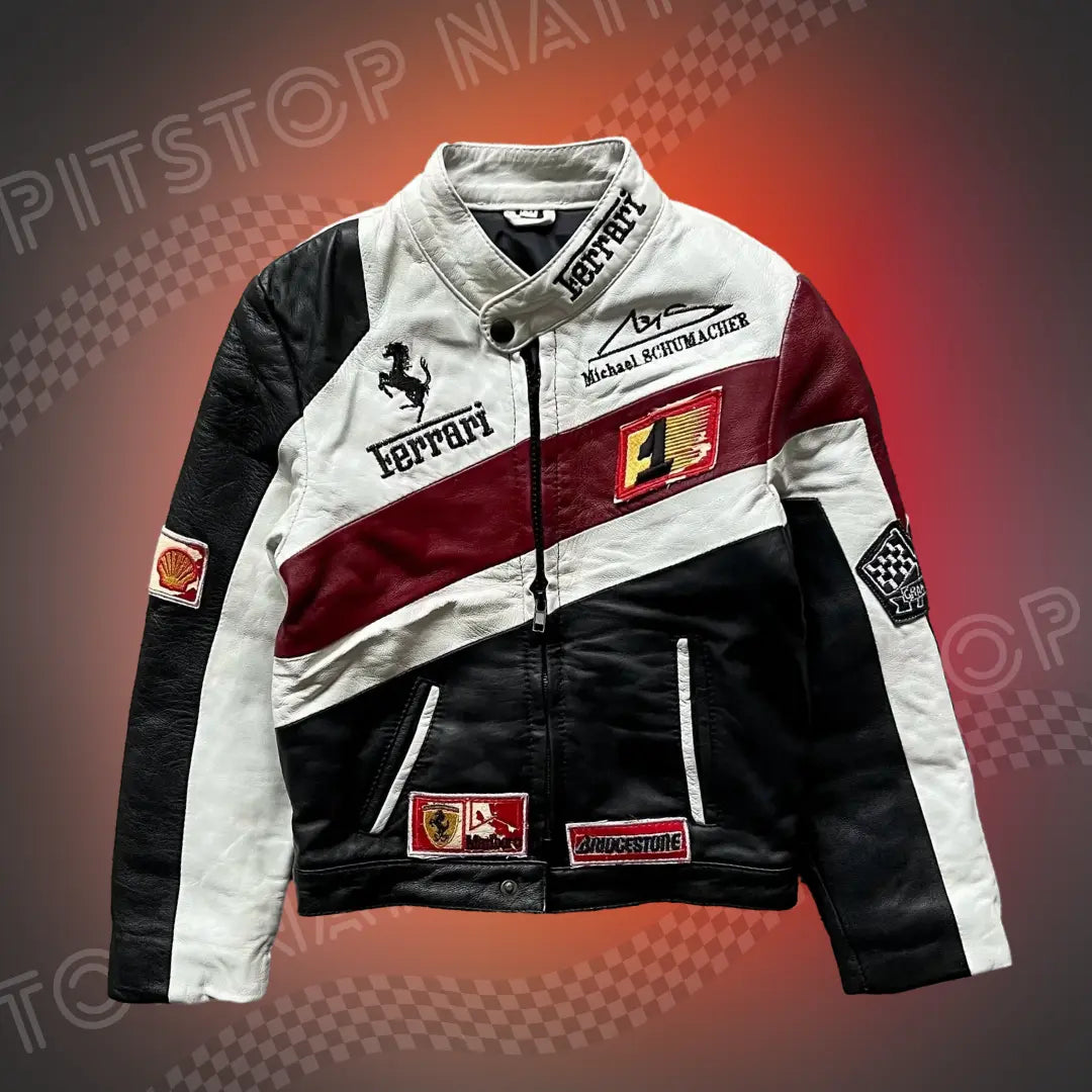 Unisex tricolor leather racing jacket in black, white and red, featuring Ferrari branding, Michael Schumacher signature, and sponsor patches.