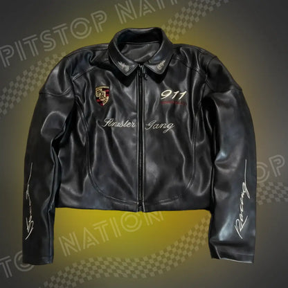 Unisex black leather racing jacket featuring Porsche crest patch, 911 embroidery, 'Sinister Gang' script on chest, and white 'Racing' sleeve text.