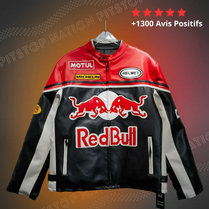Black and red unisex racing jacket in vegan leather featuring large Red Bull logo on chest, Motul and Michelin sponsor patches, and white sleeve stripes